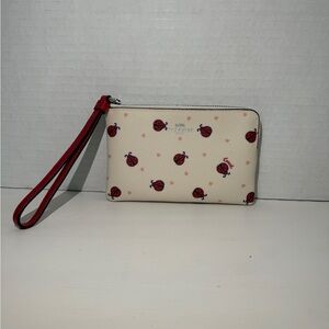 Coach Cream and Red Ladybug Wristlet